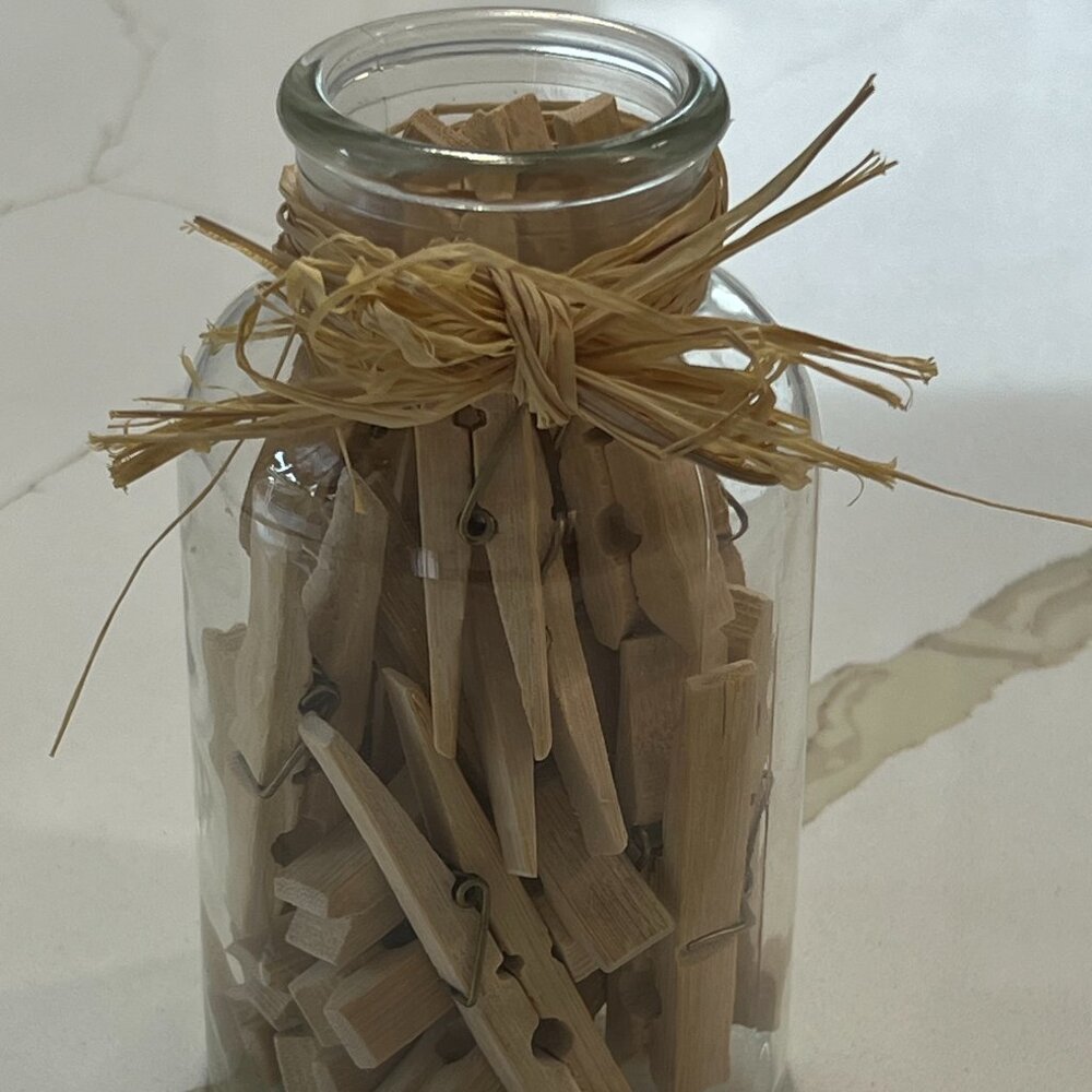 Laundry Decor-Glass Decanter Filled With Clothespins
